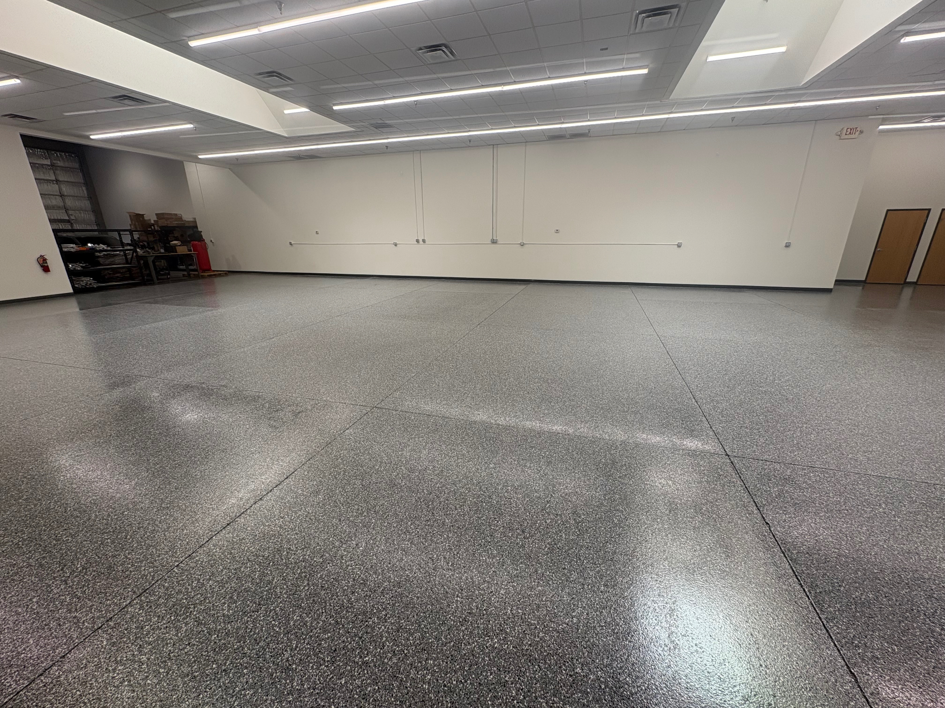 Commercial showroom floor with full-flake polyaspartic coating